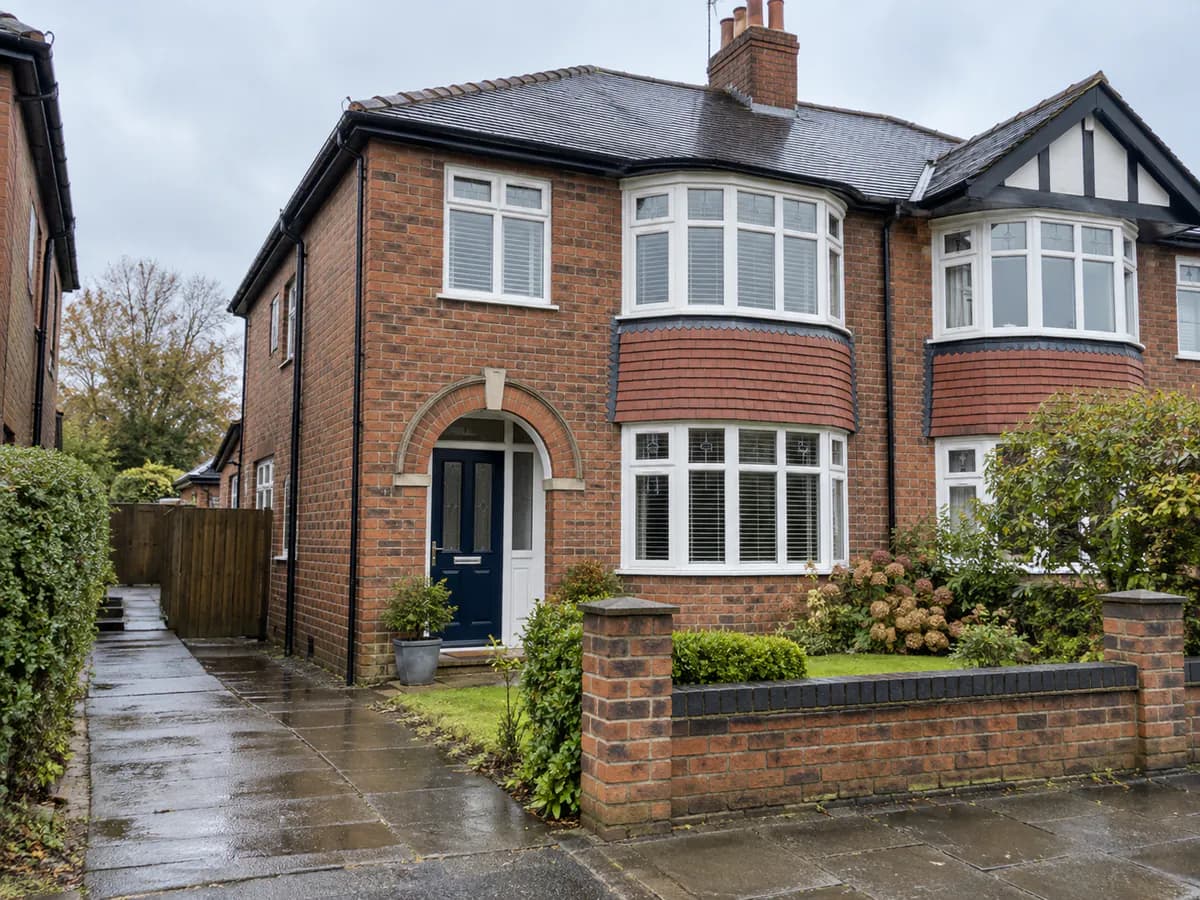 Semi-detached family home with a well-kept front garden
